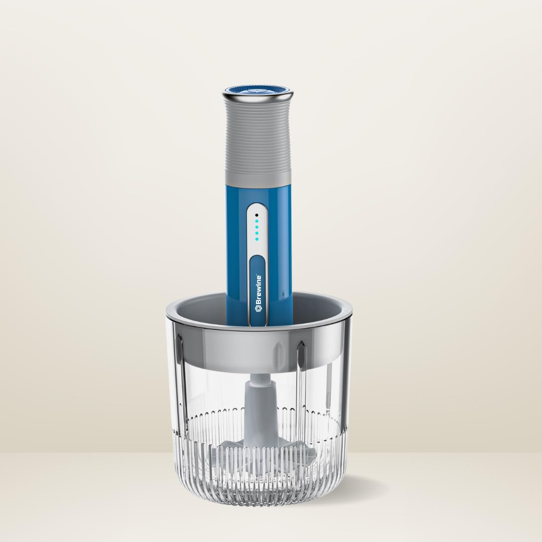 Compact electric vegetable chopper with one-touch operation mincing raw ground meat with fresh vegetables bell peppers onions