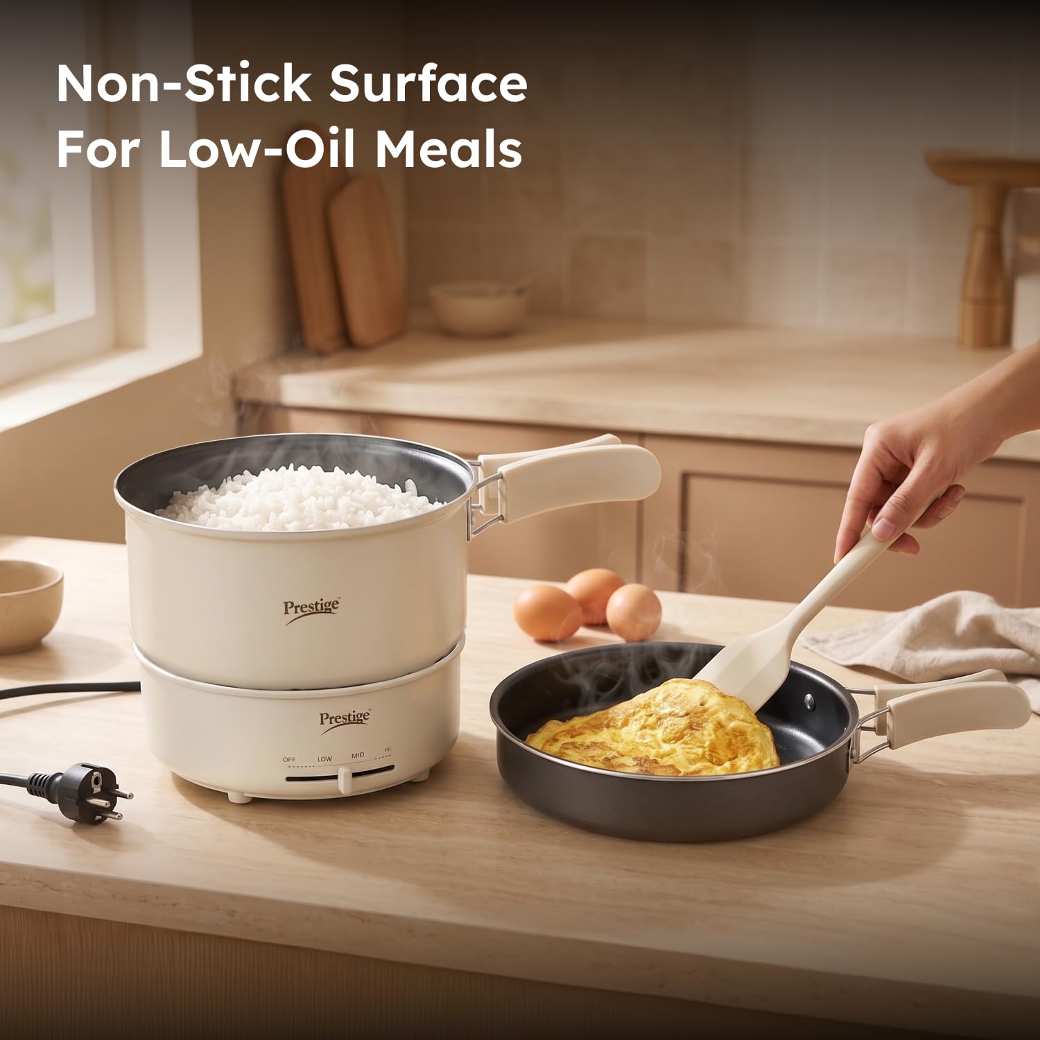 Prestige Electric Omnipot lid with steam vent releasing steam during cooking