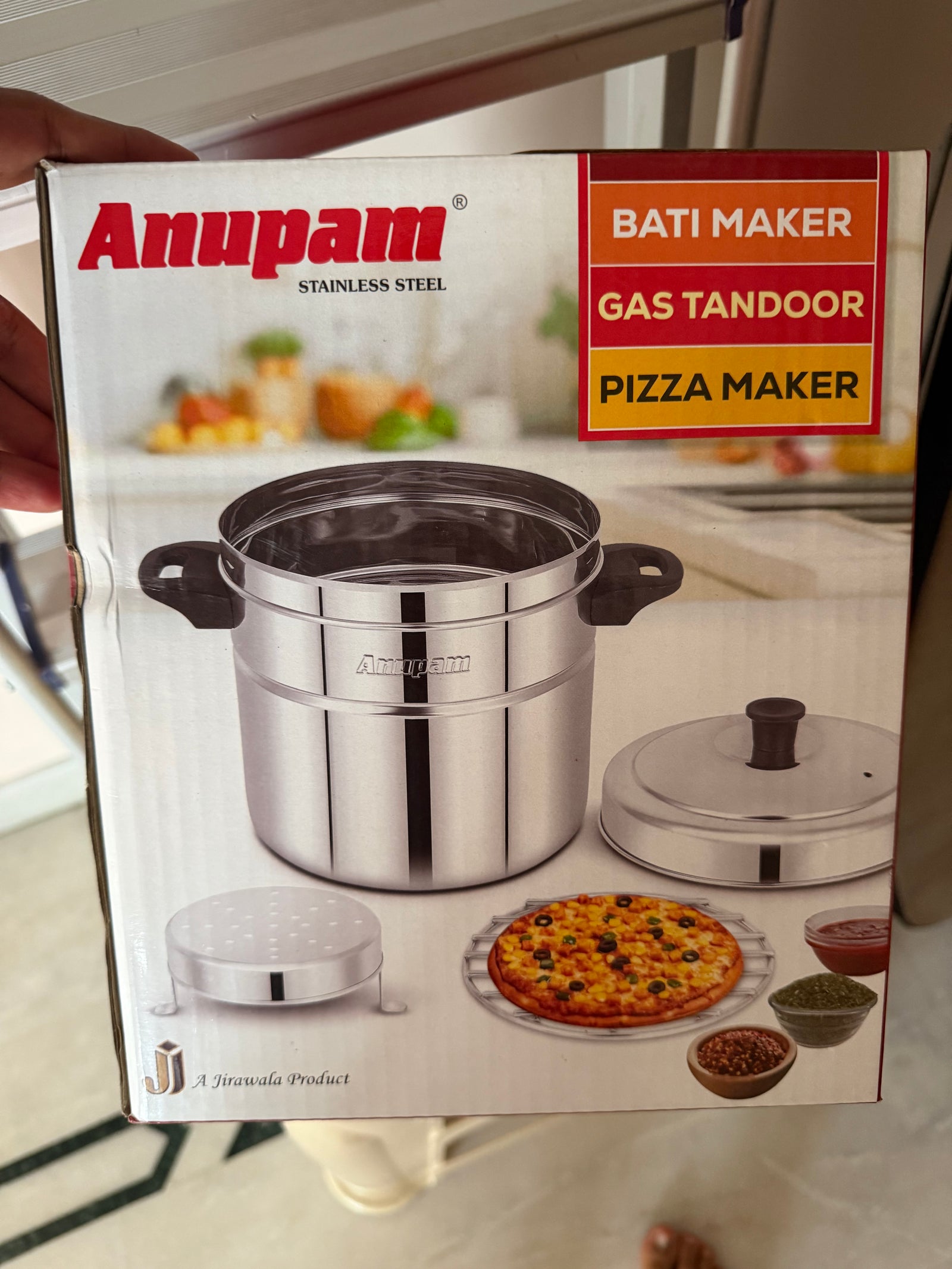 Anupam brand bati maker gas tandoor product box showing red packaging and product details