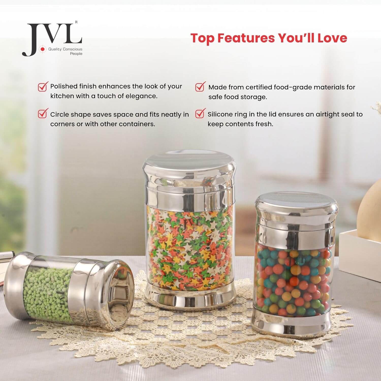 JVL kitchen storage containers with colorful contents on a table.