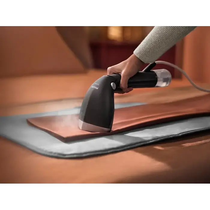 Premium Philips handheld steamer with metal steam plate and pointed tip design