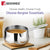 Bergner pot with coffee on a wooden coaster, surrounded by kitchen items and plants.