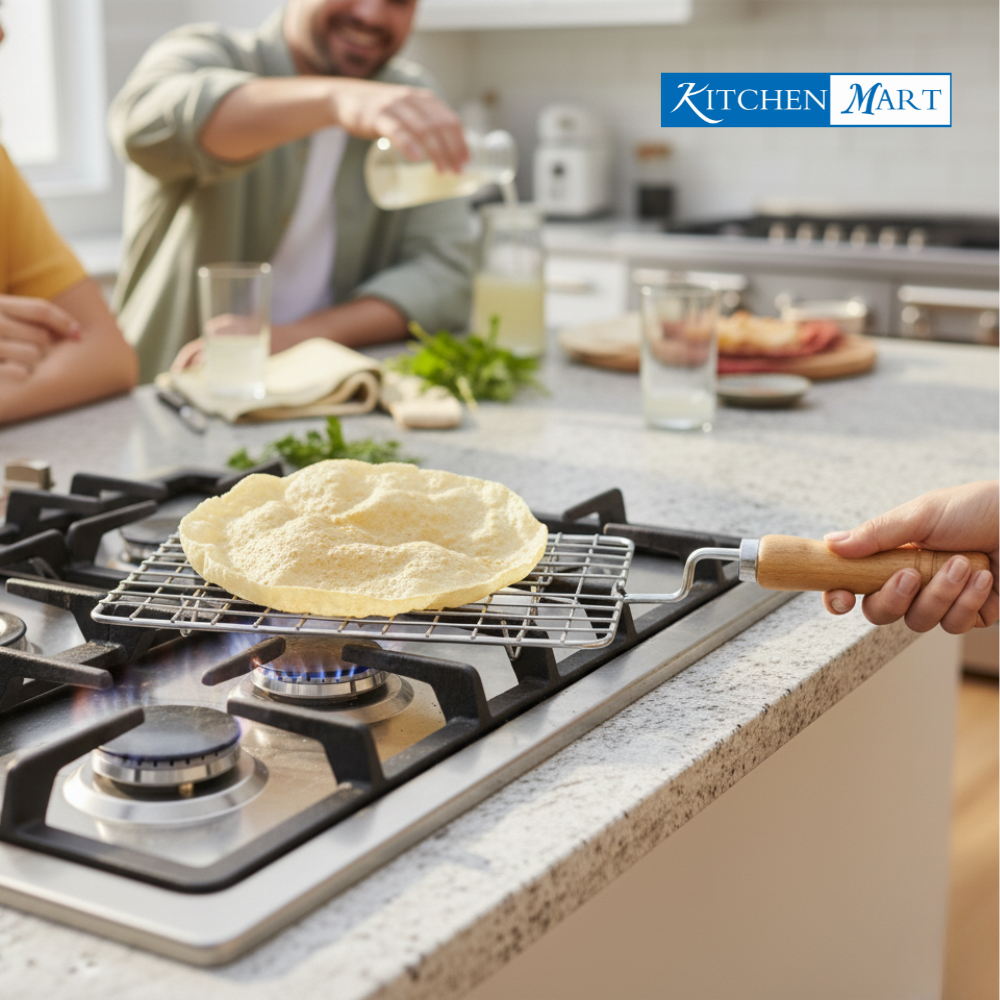 Kitchen Mart steel papad roaster displaying square shape and heat resistant wooden handle