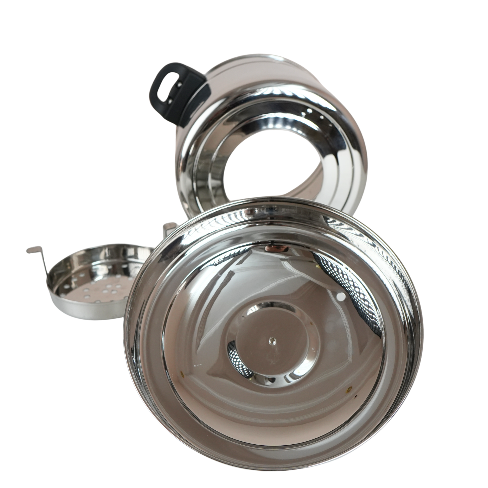 Disassembled Anupam bati maker showing all four components including perforated bati disc