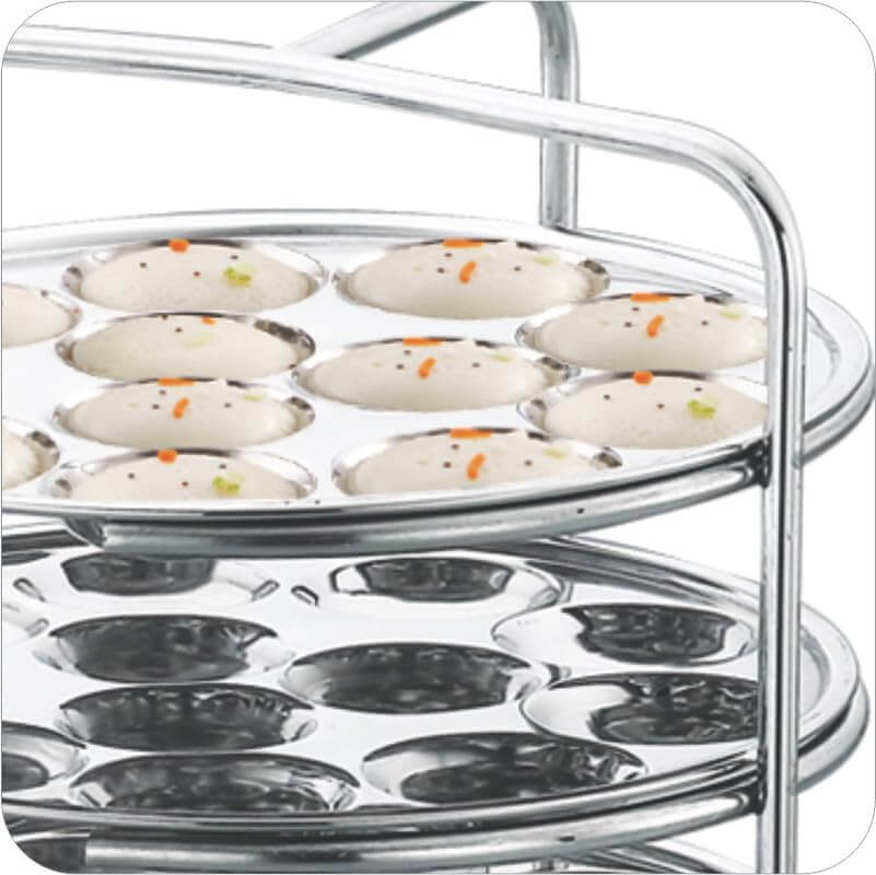 JVL stainless steel idly maker set showing thatte idlies in multi-layered plates, ideal for traditional South Indian cooking.