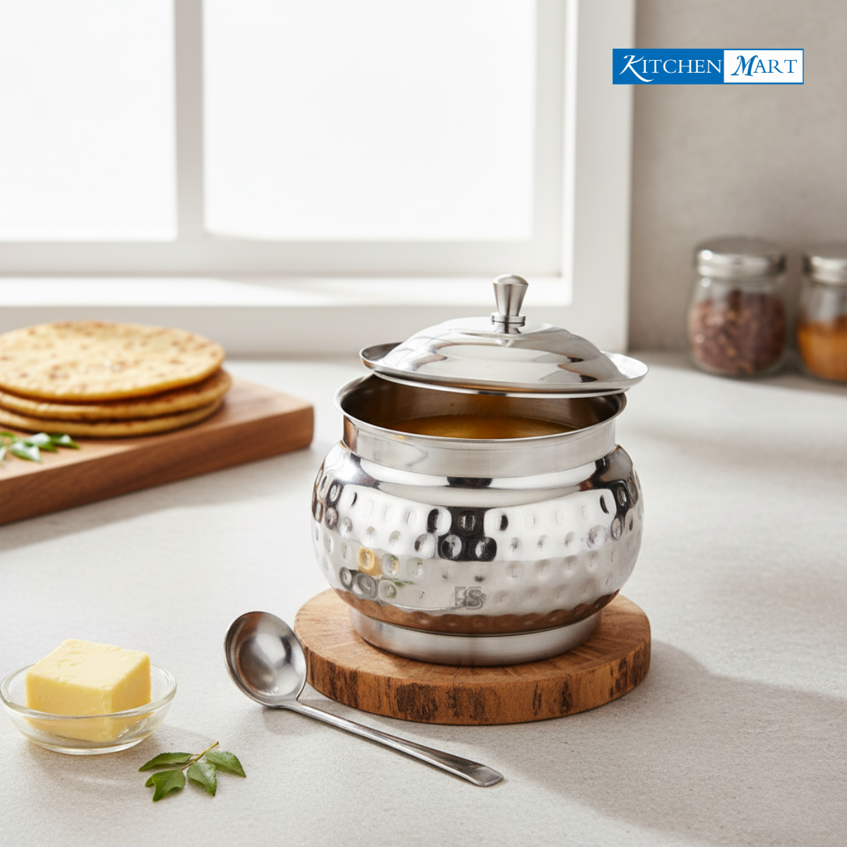 Stainless steel ghee pot with lid and spoon traditional Indian design
