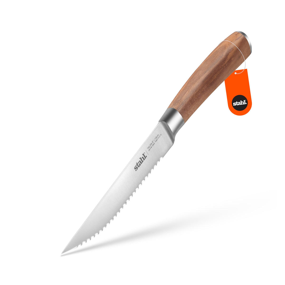 Stahl Talon tomato and steak knife with serrated blade and walnut wood handle on a wooden board