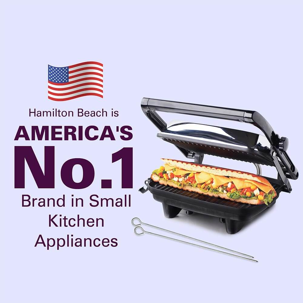 Hamilton Beach grill with a hot dog and vegetables on a light purple background, featuring the brand's claim as 'America's No.1 Brand in Small Kitchen Appliances'.