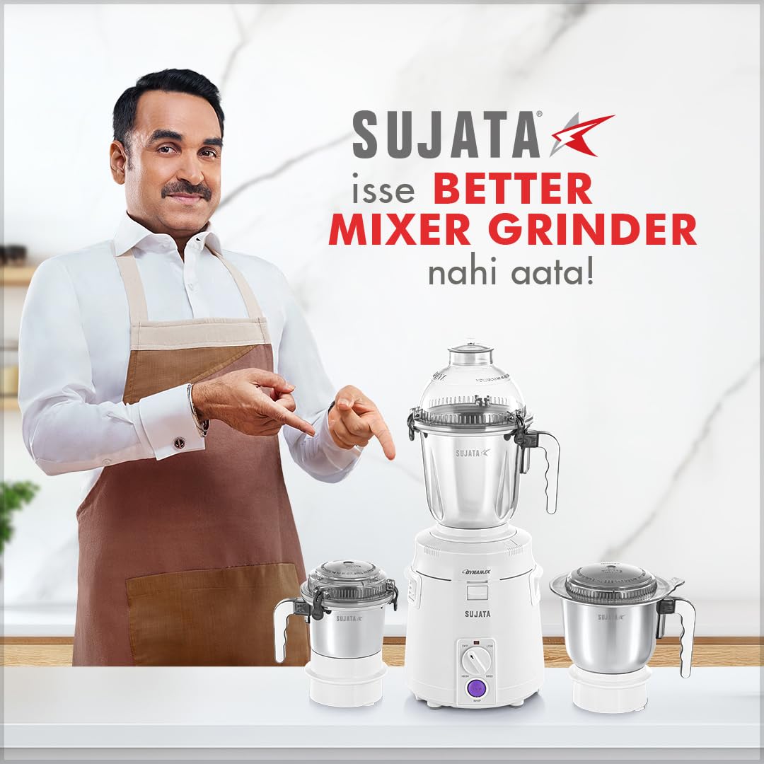 Sujata Dynamix 900W mixer grinder with 3 stainless steel jars displayed on a kitchen countertop with pankaj tripathi