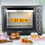 Borosil Pro 60L OTG showing illuminated cooking chamber and temperature controls