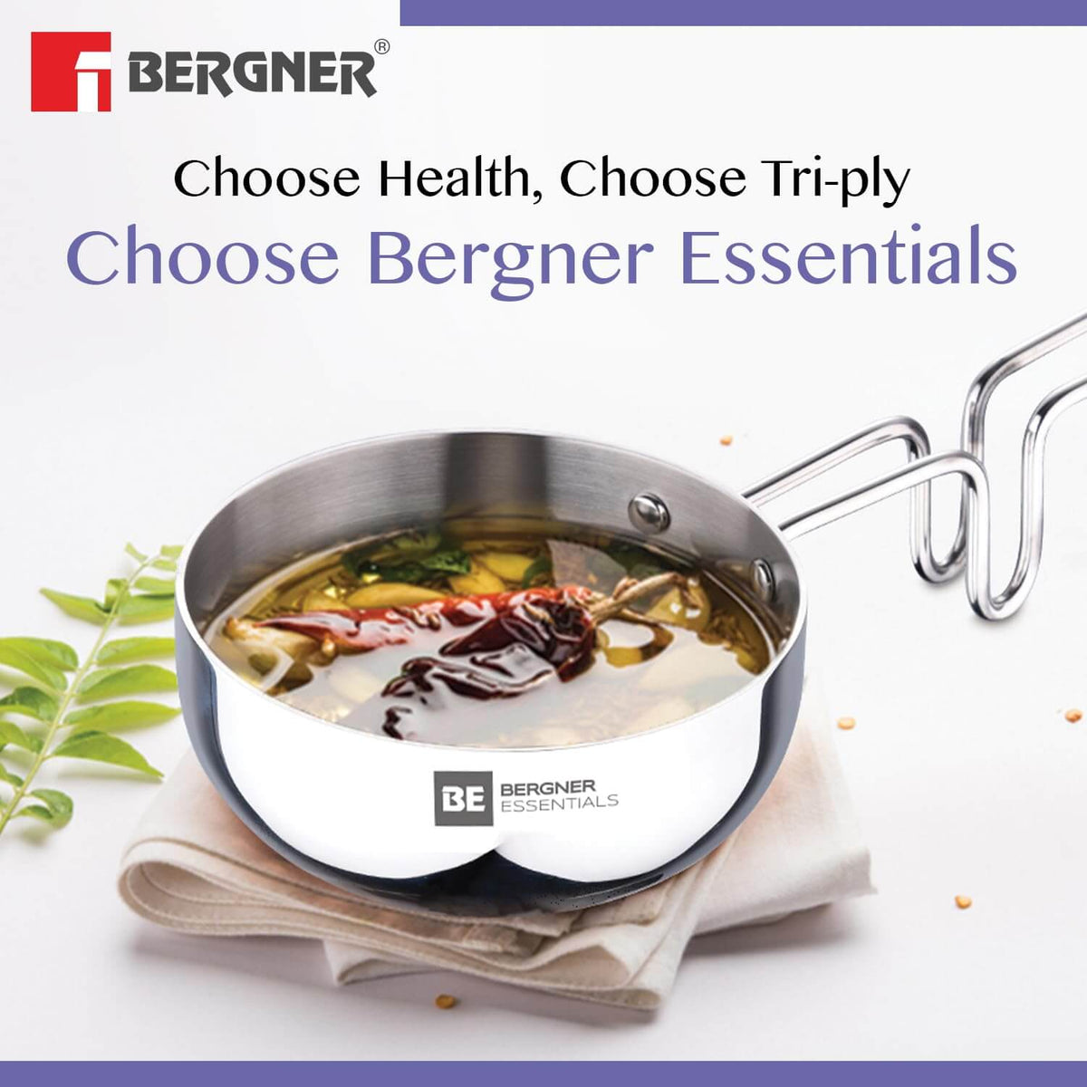 Bergner Essentials Tri-Ply Stainless Steel Tadka Pan, ideal for healthy cooking with rich flavors.