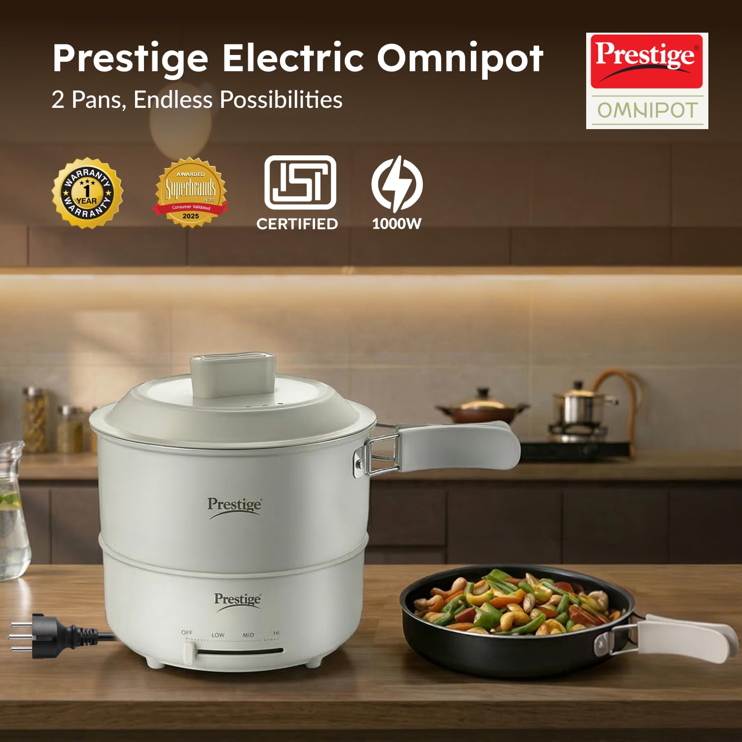 Prestige Electric Omnipot 1.3 litre electric cooking pot with fry pan and lid on a kitchen counter