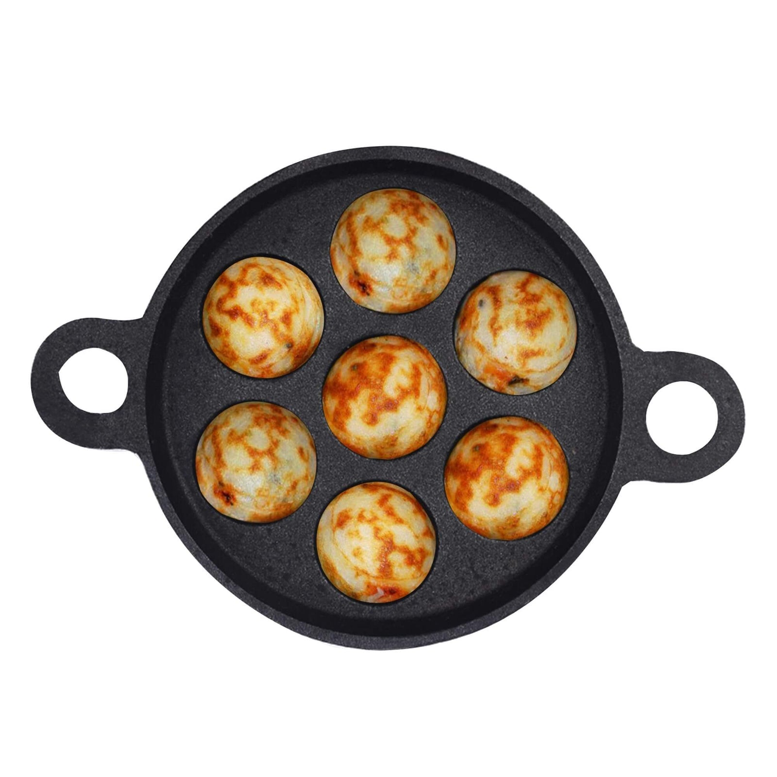 Indus Valley cast iron paniyaram pan with six perfectly cooked paniyaram, showcasing its non-stick properties.