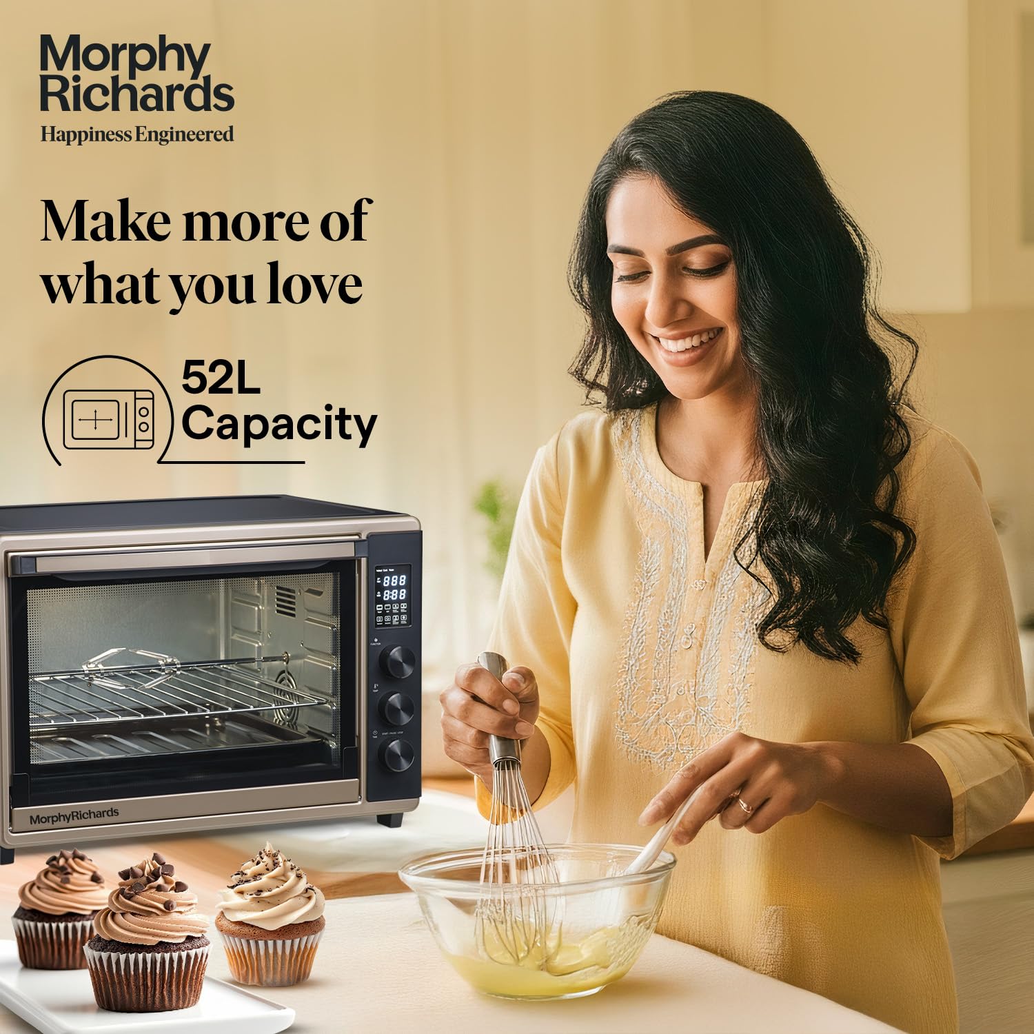 Woman in yellow kurti baking chocolate cupcakes using Morphy Richards 52L capacity digital oven toaster grill in modern kitchen