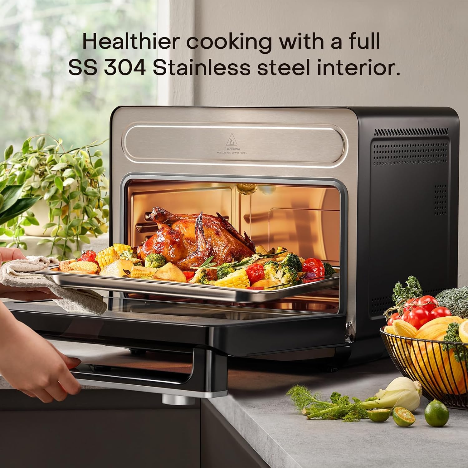 Nutricook Steami X steam air fryer oven stainless steel 304 interior with roast chicken tray