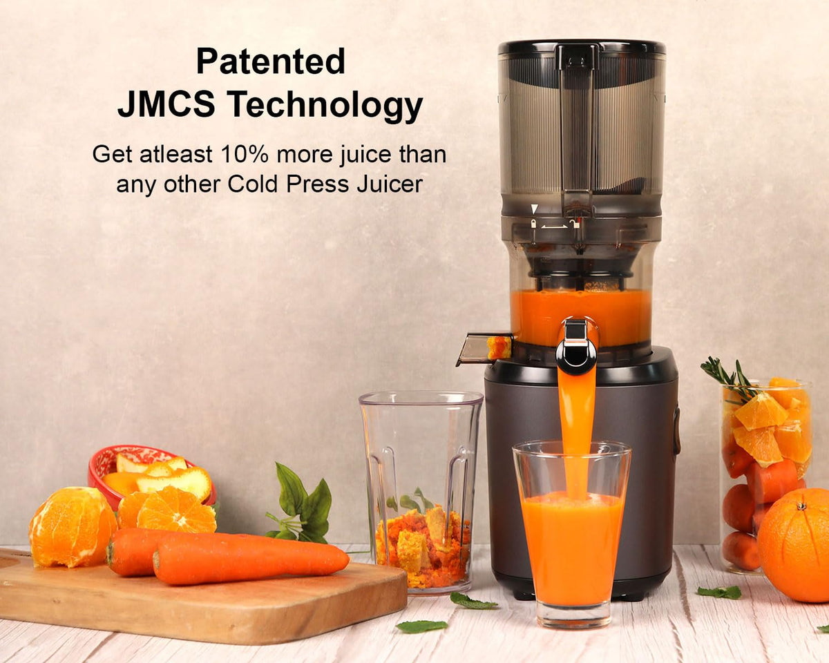 Kuvings AUTO6 Slow Juicer demonstrating JMCS technology with fresh vegetable extraction