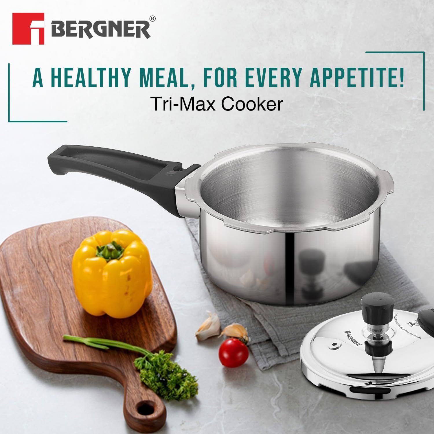 Bergner Trimax stainless steel pressure cooker combo with glass lid on white background