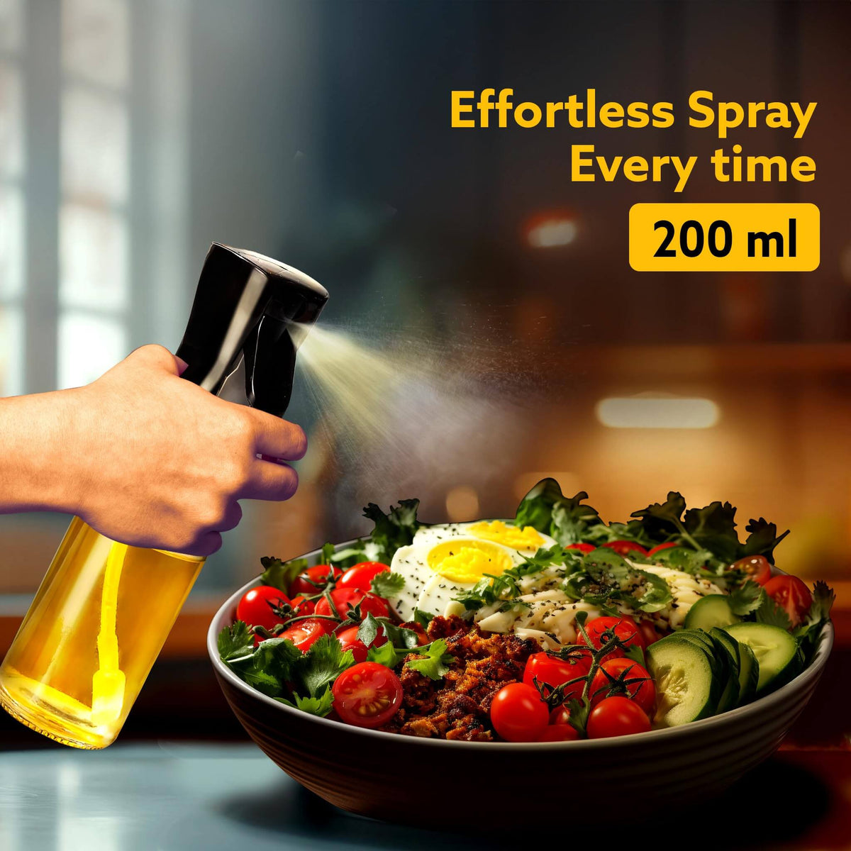 Person using a spray bottle over a salad with text 'Effortless Spray Every time 200 ml'.