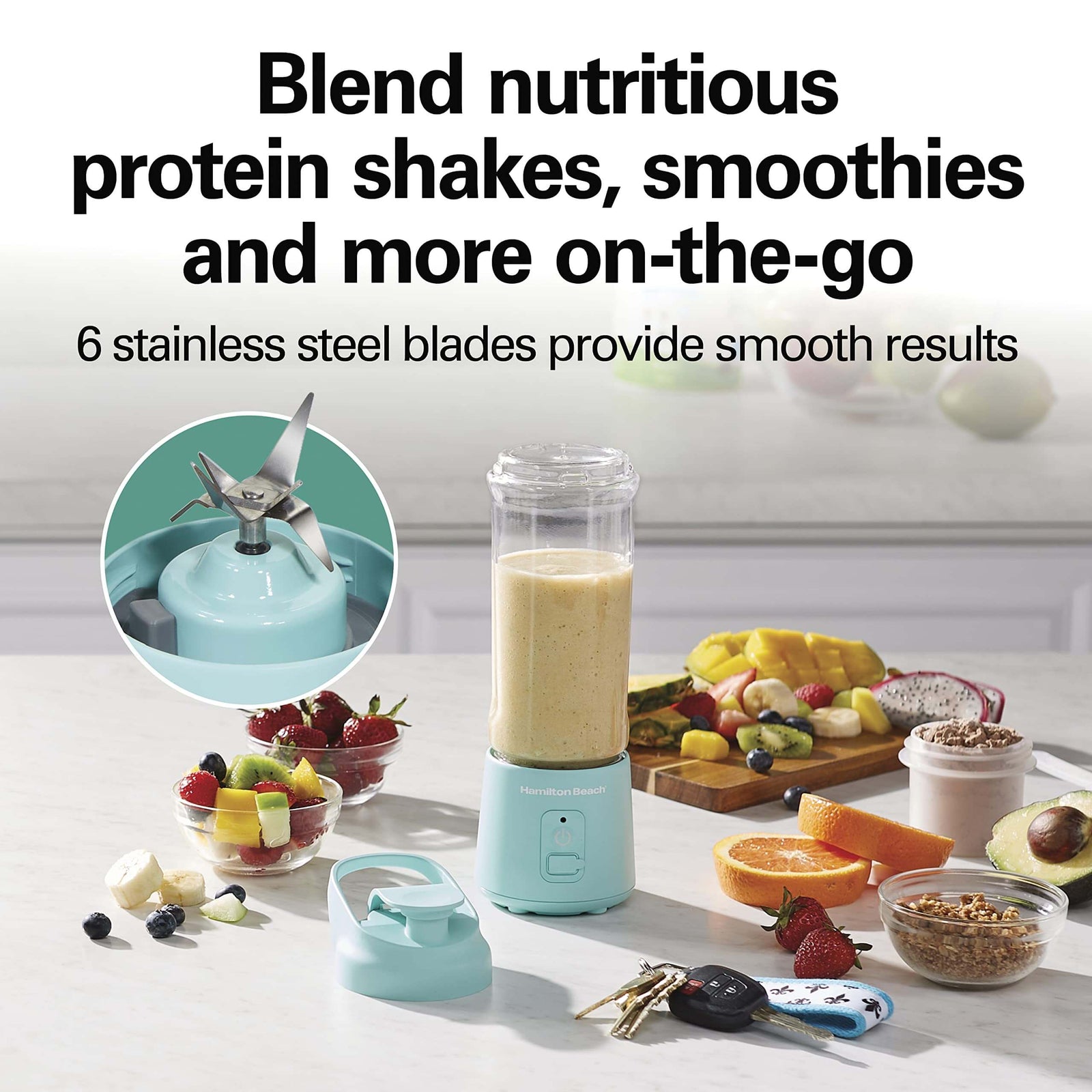 On-the-go rechargeable blender in vibrant aqua color lifestyle image
