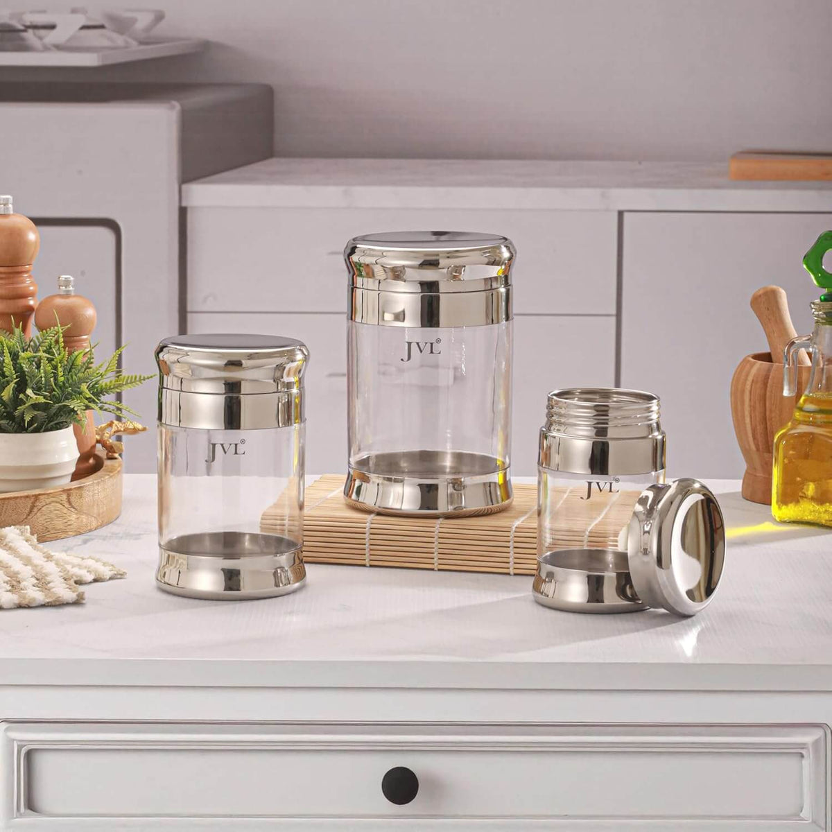 JVL Fusion FOC kitchen canister showing proper care instructions for mirror finish